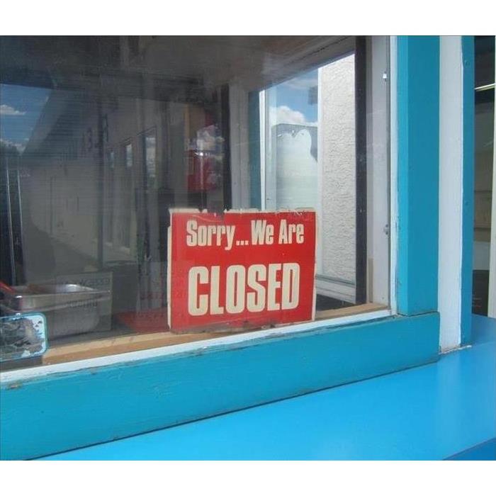 closed sign in a window